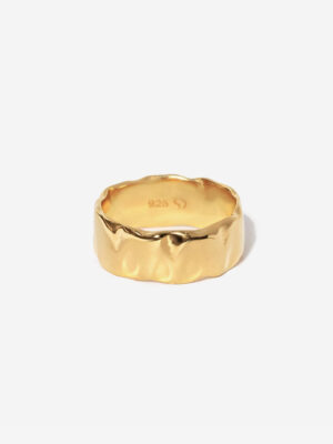 A wide gold ring with a flowing organic texture. The ring is made from gold vermeil (gold plated silver)