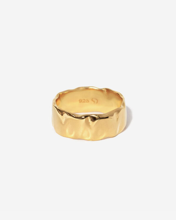 A wide gold ring with a flowing organic texture. The ring is made from gold vermeil (gold plated silver)