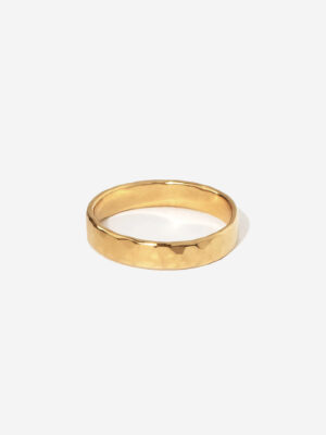 A 3mm gold ring band with a hammered surface texture. The ring is gold vermeil and 100% handmade