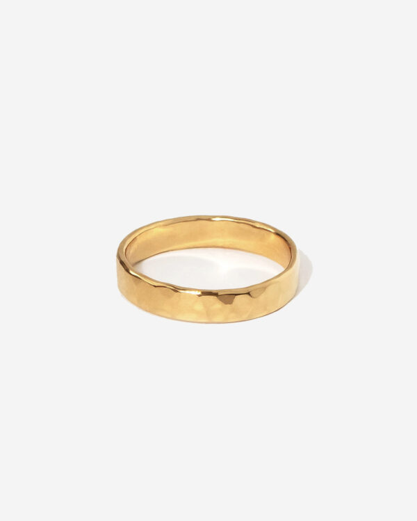 A 3mm gold ring band with a hammered surface texture. The ring is gold vermeil and 100% handmade