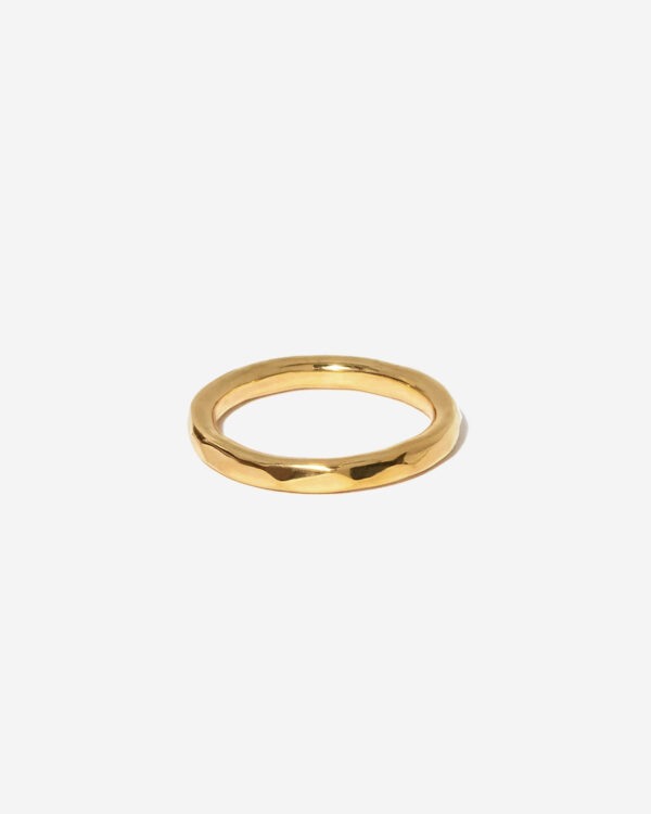 A thicker gold stacking ring with hammered facets. The ring is gold vermeil and 100% handmade