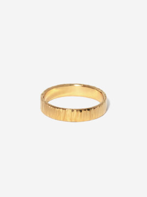 A 3mm wide gold ring band with a beautiful hammered surface texture. The ring is 100% handmade with Sterling Silver and Gold plating