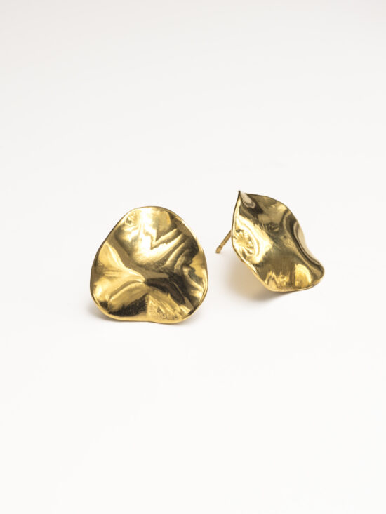 Close-up of polished gold vermeil Tide earrings showing the smooth, wavy finish